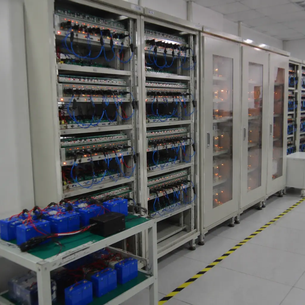 Battery aging test cabinet with charging racks in the factory lab